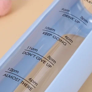 bouteille graduée en verre